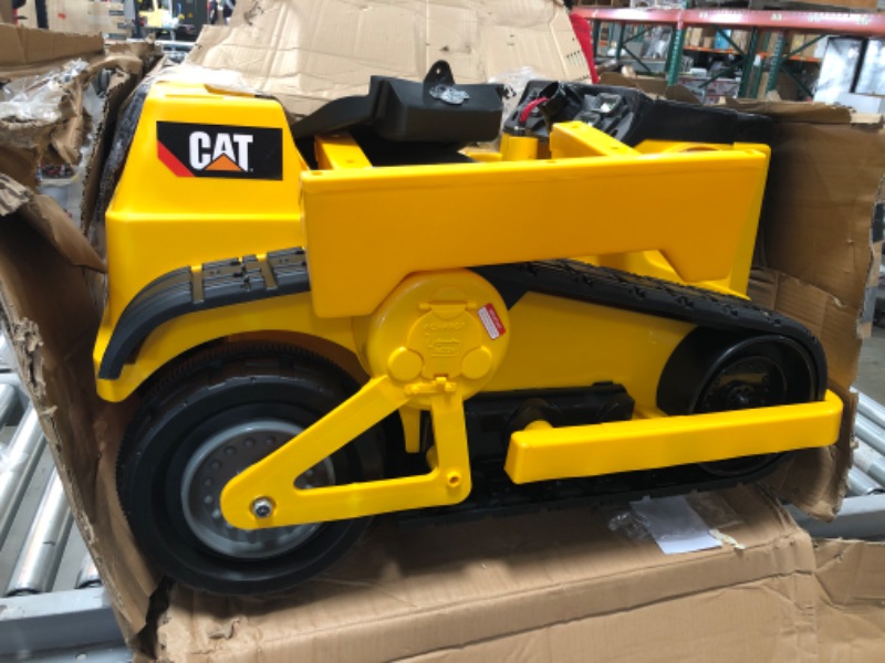 Photo 2 of (UNABLE TO LOCATE BATTERY)
Kid Trax CAT Bulldozer 12V Battery Powered Ride-On, Yellow