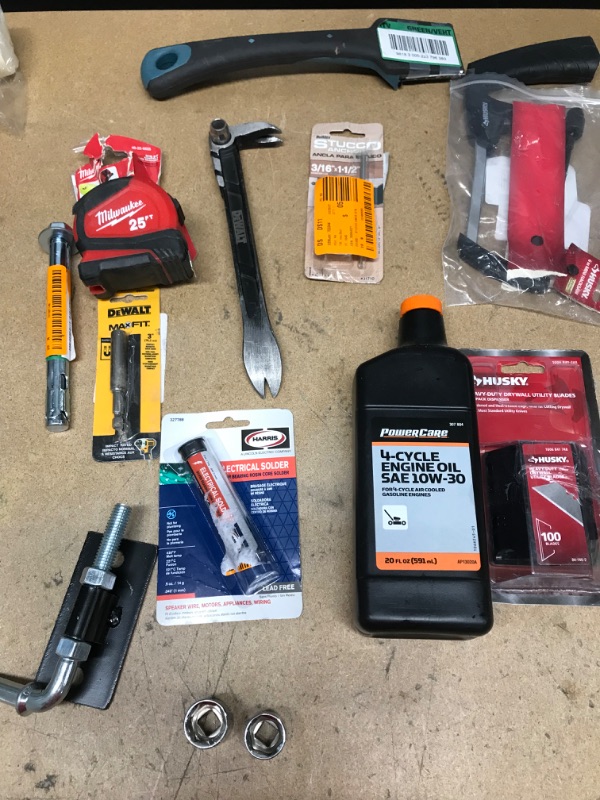 Photo 2 of ***NON-REFUNDABLE***
ASSORTED TOOLS
MALLET, TAPE MEASURE,LITTLE HAND SAW, SCRAPER, BUNGEE CORD,4-CYCLE OIL