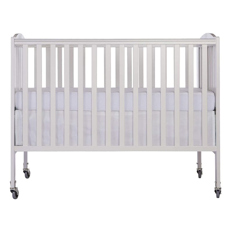 Photo 1 of Dream On Me Folding Portable Convenience Full-Size Crib, White