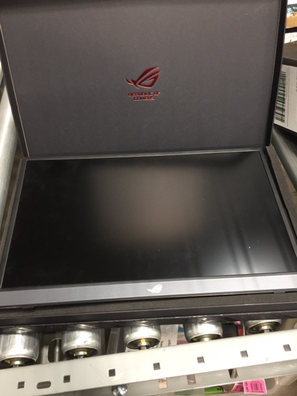 Photo 2 of ASUS ROG Strix 15.6” 1080P Portable Gaming Monitor (XG16AHPE) - Full HD, 144Hz, IPS, G-SYNC Compatible, Built-in Battery, Kickstand, USB-C Power Delivery, Micro HDMI, for Laptop, PC, Phone, Console****MISSING POWER CORD****
