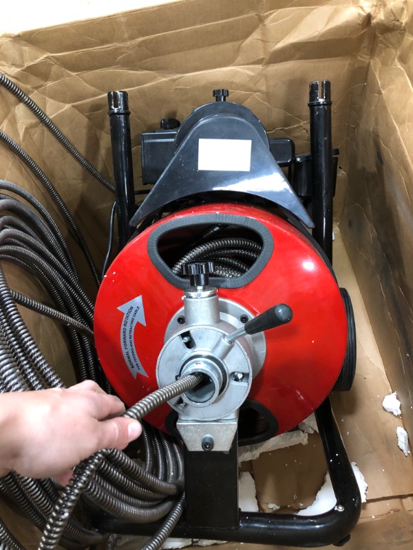 Photo 4 of VEVOR Drain Cleaner Machine 100ftx1/2in Electric Drain Auger 550W Sewer Snake Drill Machine, fit 1 Inch (25mm) to 4 Inch(100mm) Pipes, w/Wheels, Cutters, Foot Switch, for Drain Cleaners Plumbers
AS IS USED, HARDWARE NOT IN ORIGINAL PACKAGING, MISSING RAGS