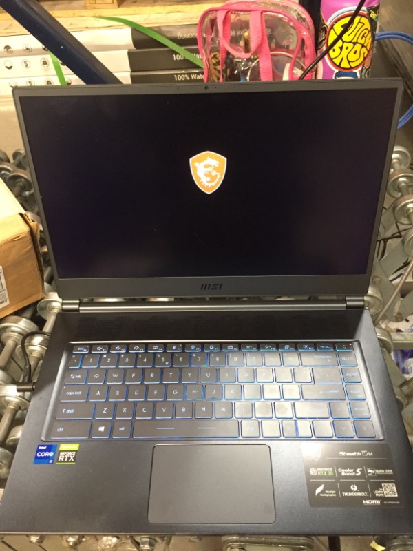 Photo 3 of MSI Stealth 15M Gaming Laptop: 15.6" 144Hz FHD 1080p Display, Intel Core i7-11375H, NVIDIA GeForce RTX 3060, 16GB, 512GB SSD, Thunderbolt 4, WiFi 6, Win10, Carbon Gray (A11UEK-009)
AS IS USED