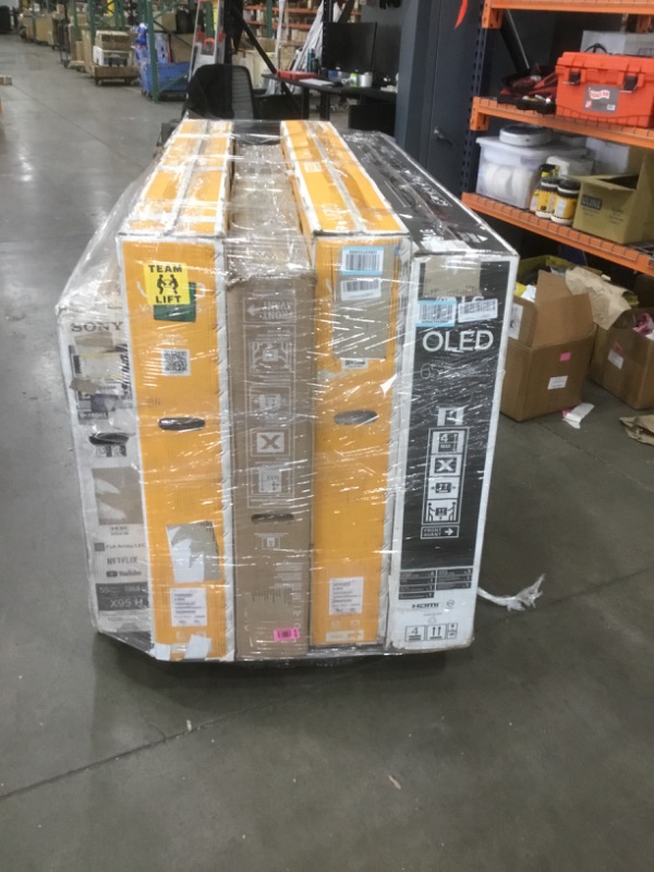 Photo 1 of  PALLET OF DAMAGED TVS SOLD AS IS NON REFUNDABLE
