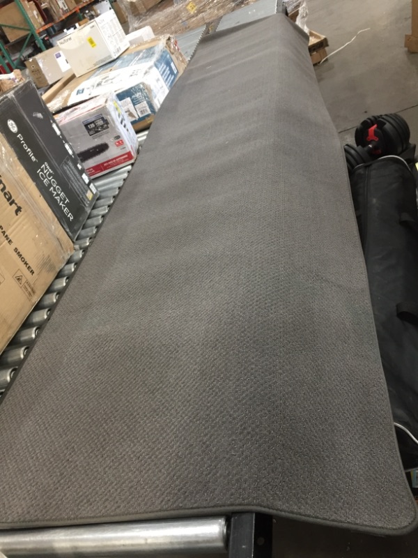 Photo 1 of 12' x 3' grey runner mat