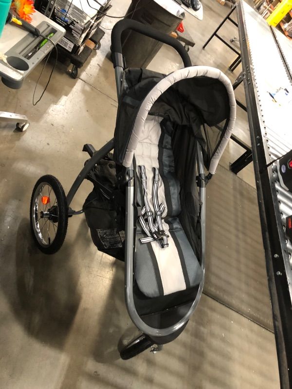 Photo 2 of Graco FastAction Fold Jogger Travel System | Includes the FastAction Fold Jogging Stroller and SnugRide 35 Infant Car Seat, Gotham