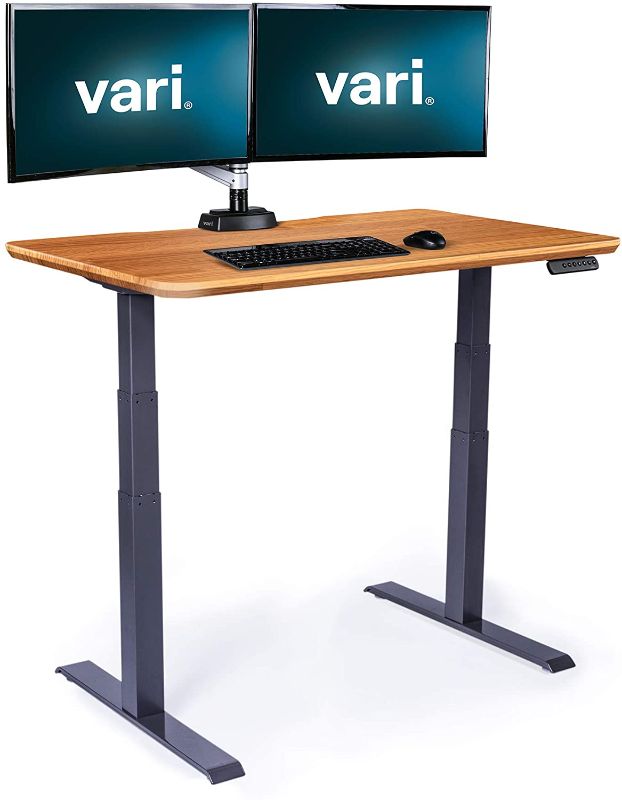 Photo 1 of Vari Electric Standing Desk 48" x 30" - Dual Motor Sit to Stand Desk - Push Button Memory Settings - Solid Top with 3-Stage Adjustable Steel Legs - Work or Home Office Desk - (Butcher Block)
MISSING HARDWARE 