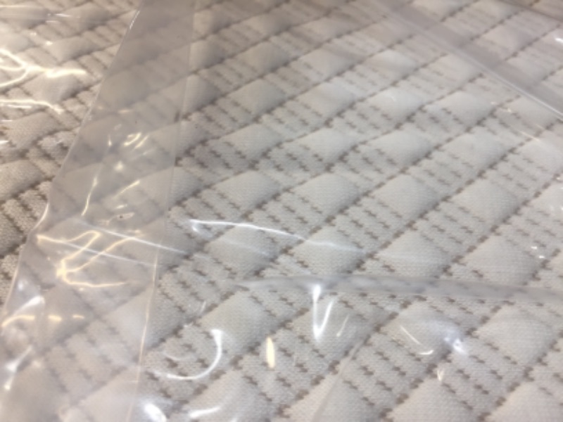 Photo 3 of CRIB MATTRESS, 48"L X 23"W