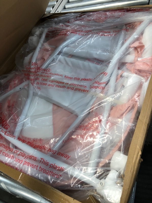 Photo 1 of Dream On Me Lacy Portable 2-in-1 Bassinet, Rose Quartz

