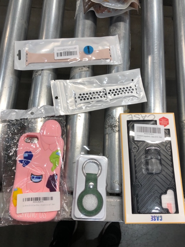 Photo 1 of PHONE CASES AND APPLE WATCH ITEMS