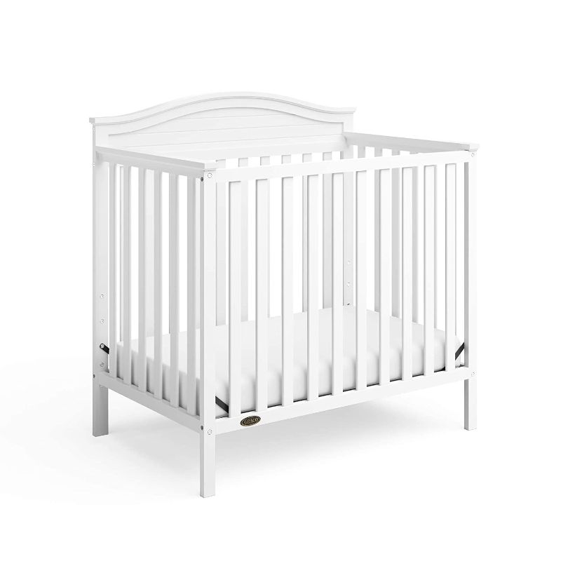 Photo 1 of Graco Stella 4-in-1 Convertible Mini Crib with Bonus Mattress – Includes Bonus 2.75 Inch Thick Mattress with Water-Resistant Cover, Converts to Twin Bed with Headboard and Footboard, White
