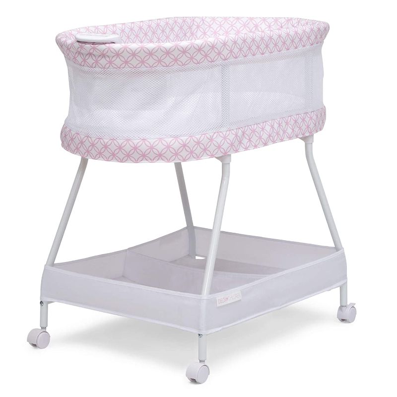 Photo 1 of Delta Children Sweet Dreams Bassinet with Airflow Mesh - Bedside Portable Crib with Vibration, Lights and Music, Pink Infinity
