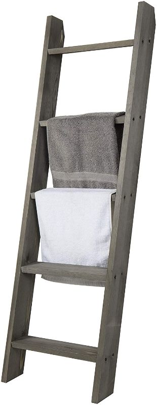 Photo 1 of Wall Leaning Ladder-Style Towel Rack and Quilt