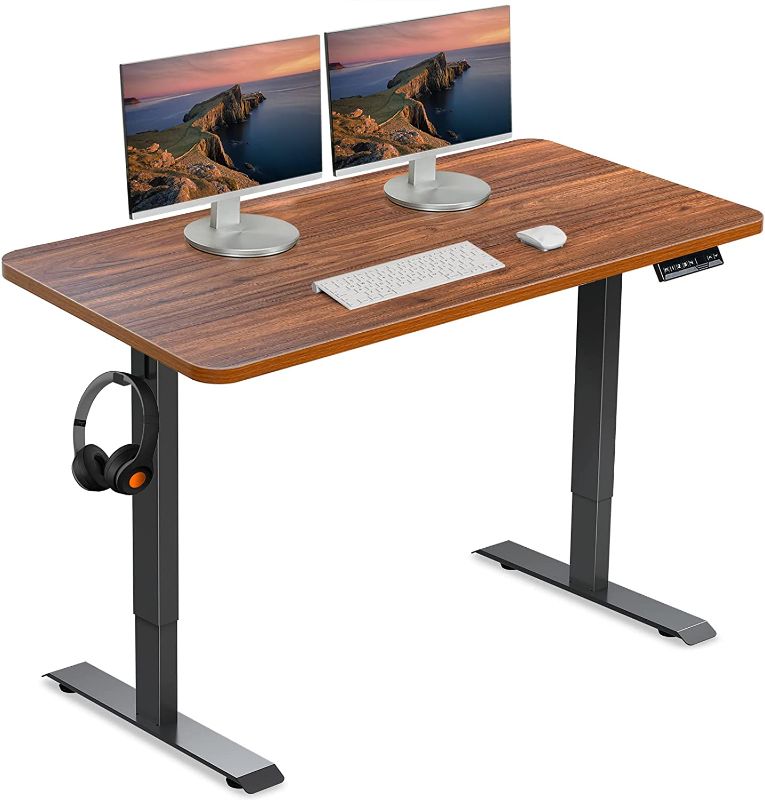 Photo 1 of ***MISSING PARTS***
WOKA Dual Motor Standing Desk, 48 x 24 Inches Adjustable Height Desk (Walnut Top + Black Frame) 
