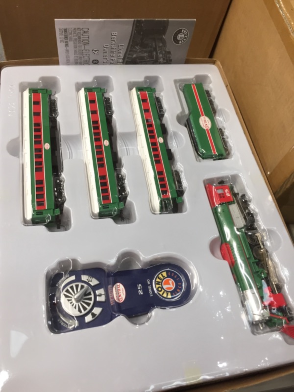 Photo 2 of *Missing straight track to complete set*
Lionel The Christmas Express Electric HO Gauge Model Train Set with Remote and Bluetooth Capability
