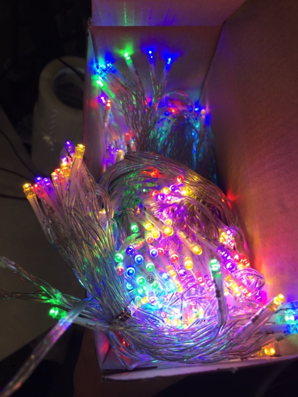 Photo 2 of Lightshow 23.43 in. H X 84 in. W. 70-Light Multi Color Christmas LuxeSparkle Icicle Light String
