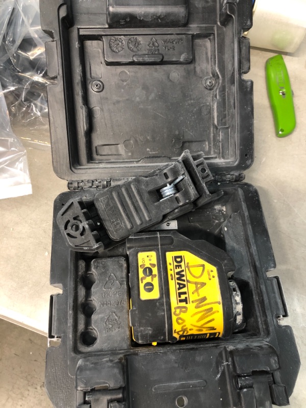 Photo 2 of *USED*
*MISSING batteries and manual* 
DEWALT 165 ft. Red Self-Leveling Cross-Line Laser Level with (3) AA Batteries & Case