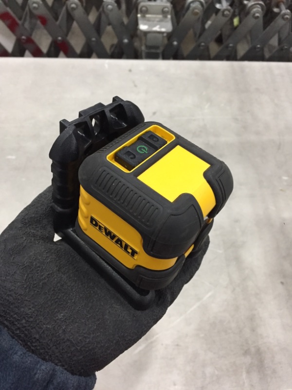 Photo 2 of *MISSING batteries and case*
DEWALT 55 ft. Green Self-Leveling Cross Line Laser Level with (2) AA Batteries & Case