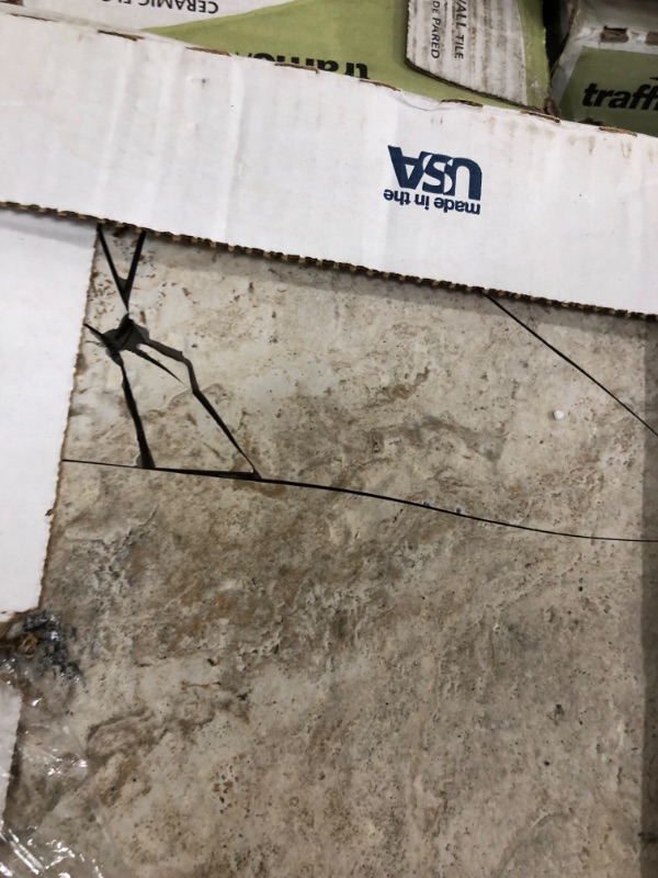 Photo 1 of *SEE last pictures for examples of damage*
Pallet of Various Tiles, Roughly 33 Cases