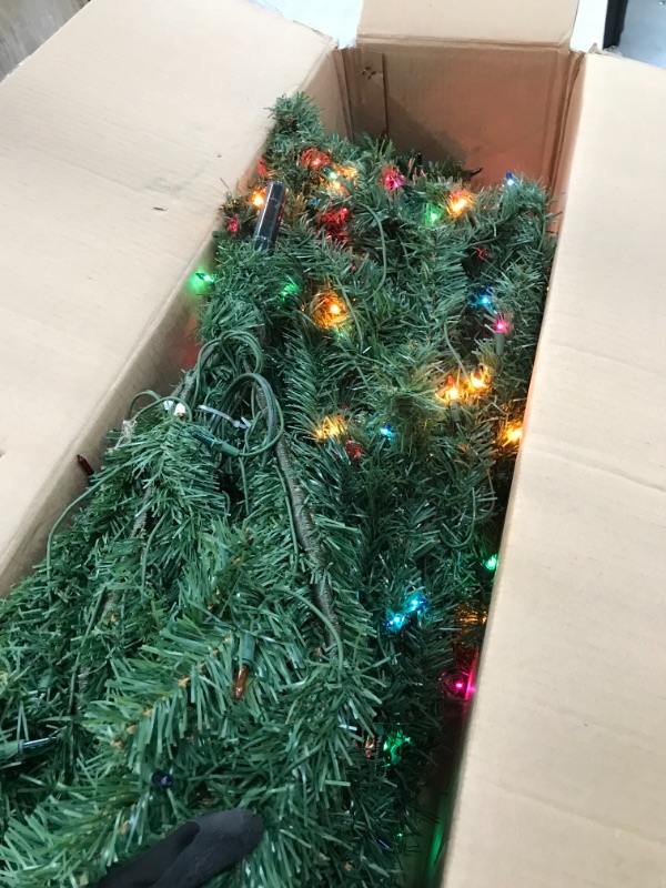 Photo 2 of *USED*
*MISSING feet*
National Tree Company Pre-Lit Artificial Medium Christmas Tree, Green, Kincaid Spruce, Multicolor Lights, 6 Feet
