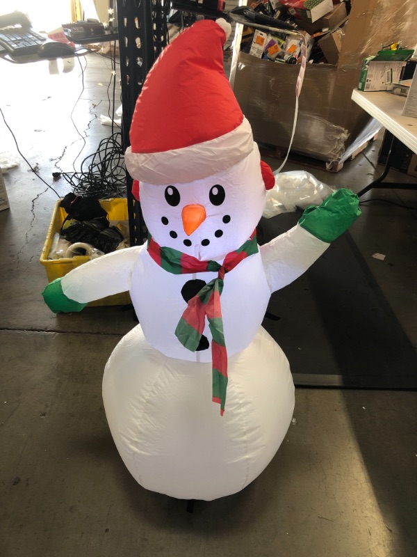 Photo 2 of *NOT EXACT stock picture, use for reference* 
Gemmy Holiday Time Airblown Inflatable Snowman, 4 Feet Tall
