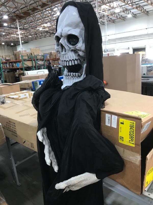 Photo 1 of 12-ft. Animated Standing Reaper Halloween Decoration**NEEDS BATTERIES FOR EYES**
