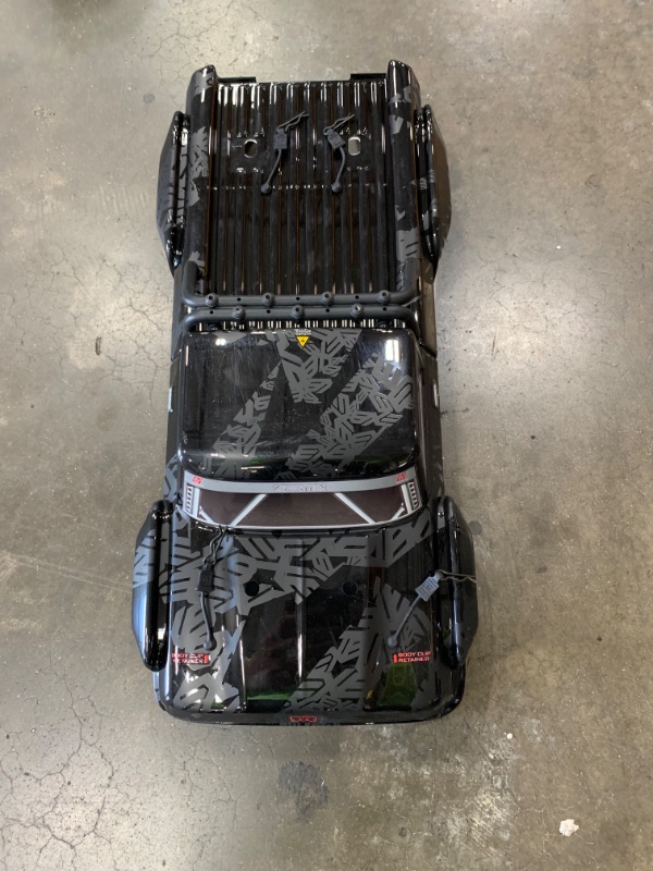 Photo 1 of ARRMA RC Truck 1/8 Outcast 6S BLX 4WD Extreme Bash Stunt Truck RTR (Battery and Charger Not Included), Black, ARA8710
