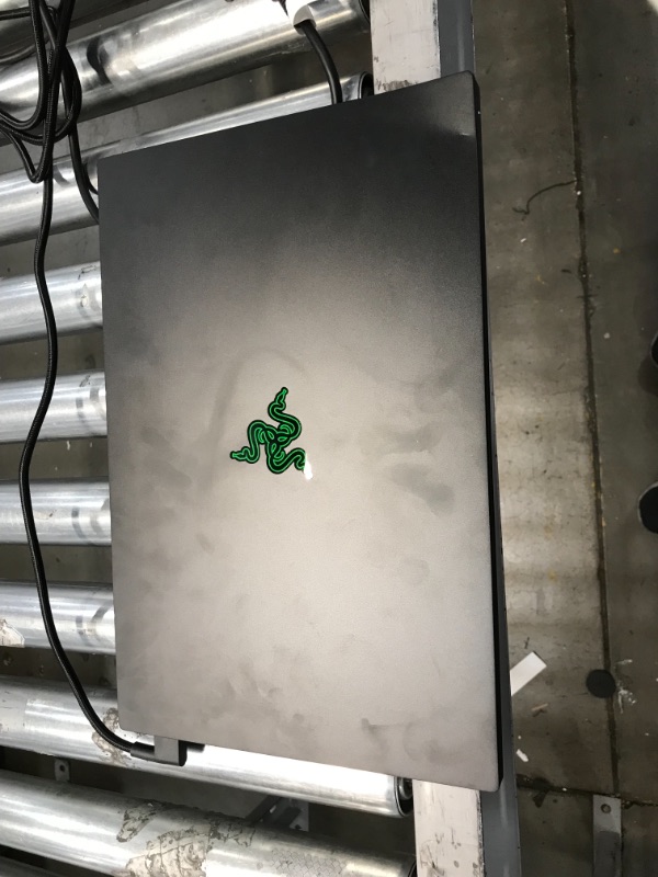 Photo 3 of SCREEN IS DAMAGED 
Razer Blade 15 Advanced Gaming Laptop 2021: Intel Core i9-11900H 8-Core, NVIDIA GeForce RTX 3080, 15.6” 4K OLED, 32GB RAM, 1TB SSD - CNC Aluminum - Chroma RGB - THX Spatial Audio - Thunderbolt 4
