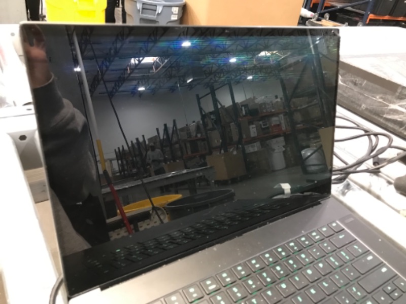 Photo 1 of SCREEN IS DAMAGED 
Razer Blade 15 Advanced Gaming Laptop 2021: Intel Core i9-11900H 8-Core, NVIDIA GeForce RTX 3080, 15.6” 4K OLED, 32GB RAM, 1TB SSD - CNC Aluminum - Chroma RGB - THX Spatial Audio - Thunderbolt 4
