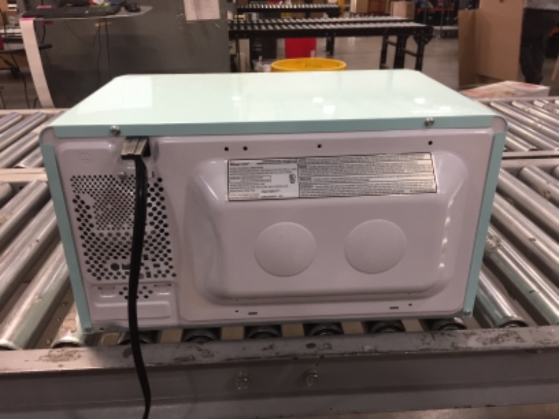 Photo 6 of Retro 0.7 cu. ft. Countertop Microwave in Mint Green
