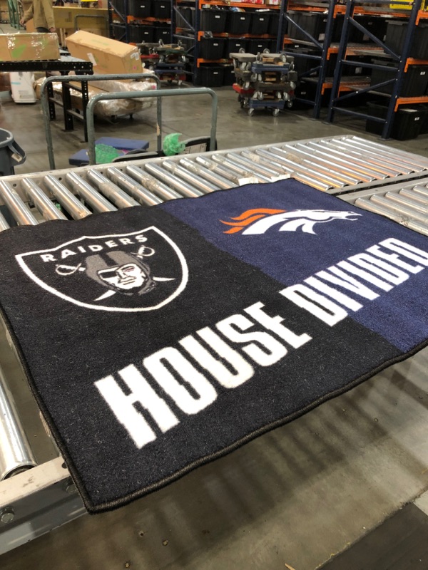 Photo 1 of 
FANMATS 15665 Team Color 33.75" x 42.5" Rug (NFL ) SEE PHOTO FOR ACTUAL TEAMS, RAIDERS/BRONCOS