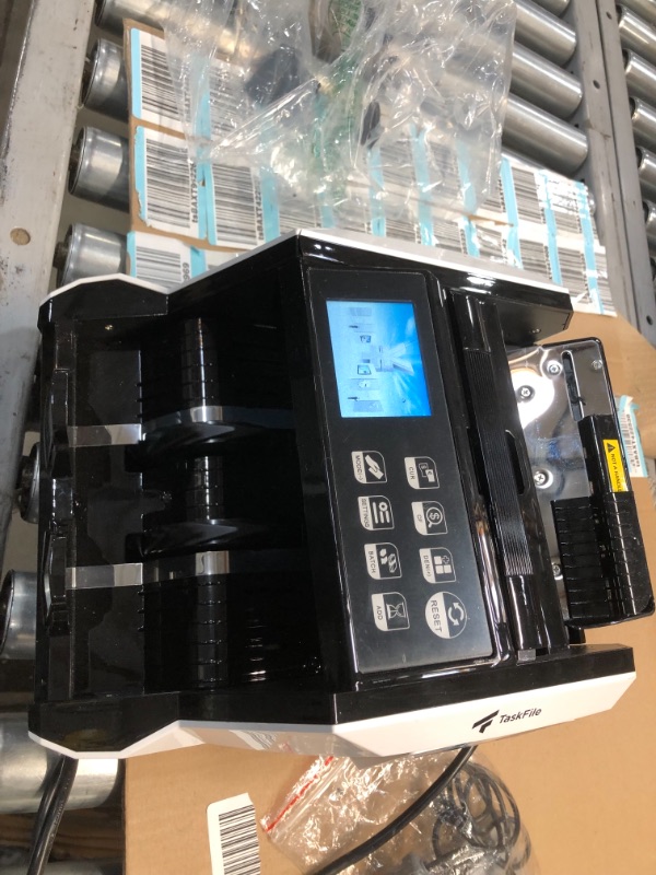 Photo 2 of **INCOMPLET AND DAMAGED**
TaskFile Money Counter Machine | Bill Counter Machine | Money Counting Machine with Included Bill Straps | Cash Counter Machine for Professional and Personal Use!
