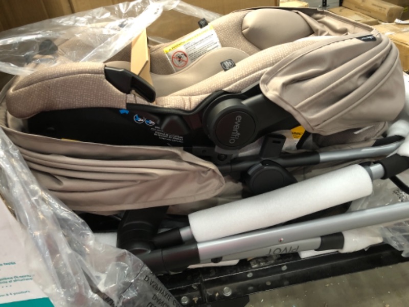 Photo 4 of Evenflo Pivot Modular Travel System with SafeMax Infant Car Seat - Sandstone