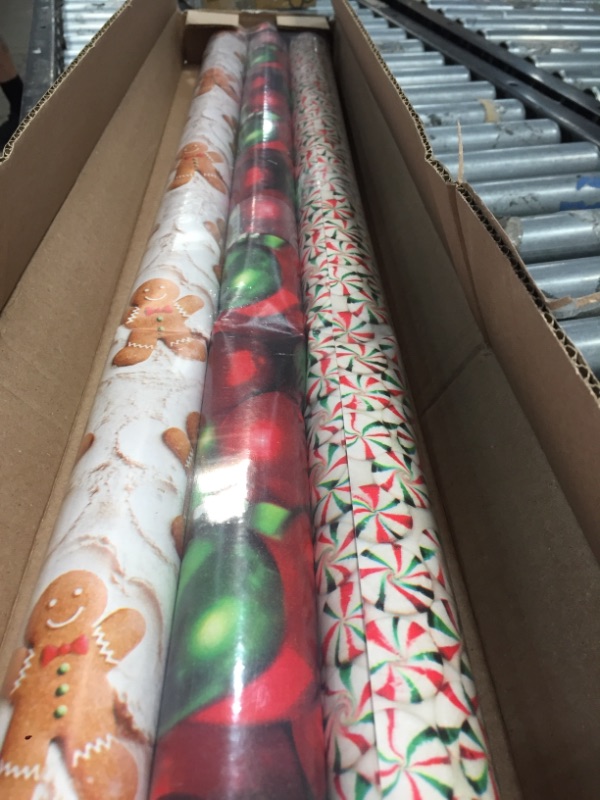 Photo 2 of 
American Greetings Reversible Christmas Wrapping Paper, Gingerbread, Ornaments and Peppermints (3 Pack, 120 sq. ft.)
Color:Gingerbread, Ornaments and Peppermints