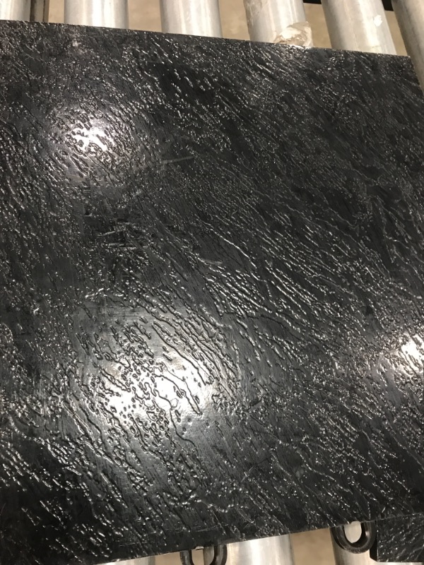 Photo 1 of BLACK PLASTIC TILE 12 X 12 **ROUGHLY 40 SQ FT**