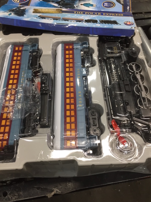 Photo 2 of Lionel The Polar Express Ready-to-Play Set, Battery-Powered Berkshire-Style Model Train Set with Remote , Black
