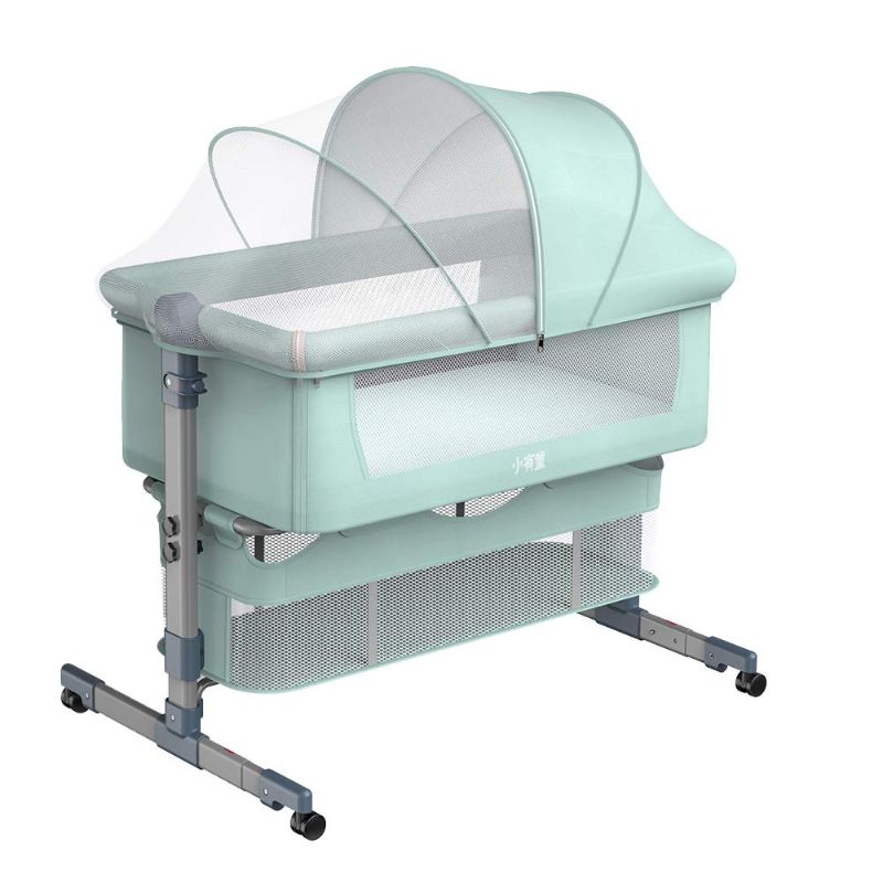 Photo 1 of Bassinet & Bedside Sleeper, Multifunctional Portable Co-Sleeping Bed, with 1 Pairs of Cute Socks, for Infant/Newborn/Baby Boy and Girl, Easy Folding with Storage Basket, Height Adjustment (Green)
