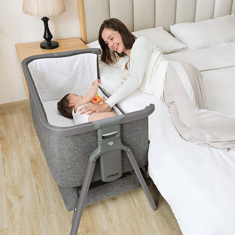 Photo 1 of AMKE Baby Bassinets,Bedside Sleeper for Baby, Quick Assemble Baby Crib with Storage Basket,Portable Bassinets for Safe Co-Sleeping, Adjustable Baby Bed for Baby Infant Newborn Girl Boy(Grey)
