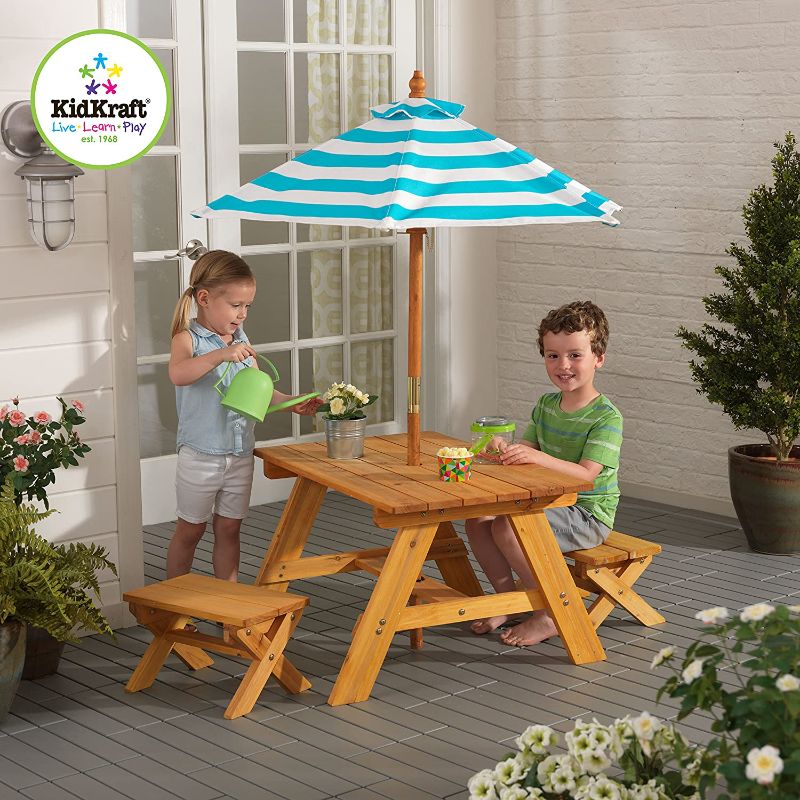 Photo 1 of KidKraft Outdoor Wooden Table & Bench Set with Striped Umbrella, Children's Backyard Furniture, Turquoise and White, Gift for Ages 3-8, Amazon Exclusive
