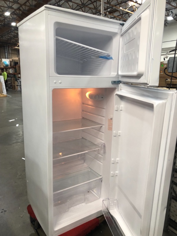 Photo 4 of **FRIDGE FRAME HAS SEVERAL DENTS AND TOP CORNERS ARE DENTED**
Magic Chef 7.4 Cu. Ft. 2-Door Mini Fridge in White
