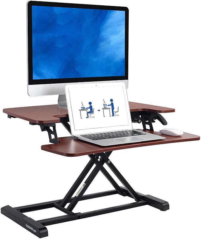 Photo 1 of FLEXISPOT Stand up Desk Converter -28" Standing Desk Riser with Deep Keyboard Tray for Laptop (28", Mahogany, M7N)
