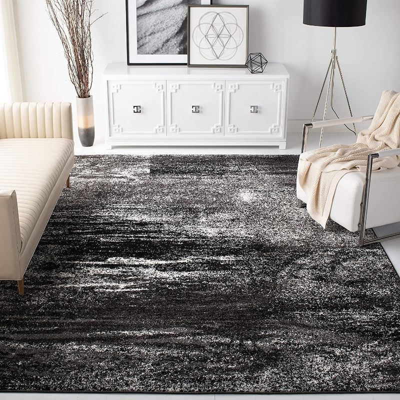 Photo 1 of **USED**
SAFAVIEH Adirondack Collection ADR112A Modern Abstract Non-Shedding Living Room Bedroom Accent Area Rug, 4' x 6', Silver / Black

