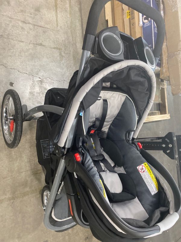 Photo 3 of Graco FastAction Fold Jogger Travel System | Includes the FastAction Fold Jogging Stroller and SnugRide 35 Infant Car Seat, Gotham
