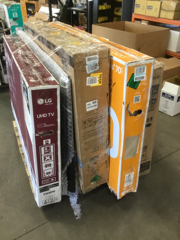 Photo 1 of PALLET OF DAMAGED TVS SOLD AS IS NON REFUNDABLE