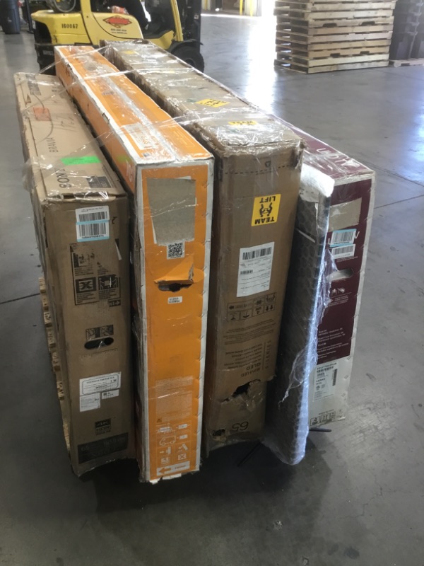 Photo 1 of PALLET OF DAMAGED TVS SOLD AS IS NON REFUNDABLE