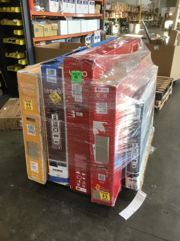 Photo 1 of Pallet of damaged tvs sold as is for parts. No refunds