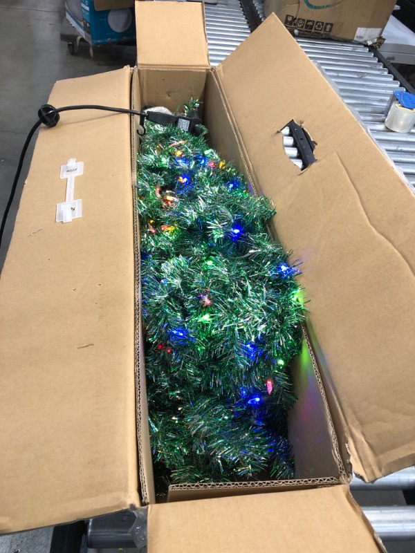 Photo 2 of Home Accents Holiday
7 ft Silver and Green Tinsel Spruce LED Pre-Lit Artificial Christmas Tree with 300 SureBright Color Changing Mini Lights
//tested, powers on