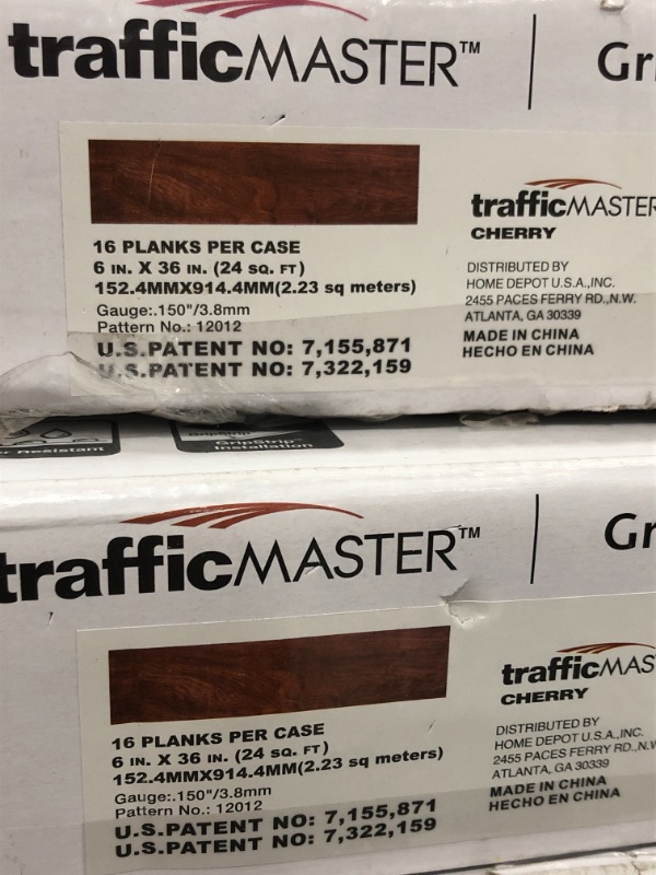 Photo 1 of 33 CASES 2 COLORS SAME BRAND AND SIZE 
Khaki Oak Dark 6 in. W x 36 in. L Luxury Vinyl Plank Flooring (24 sq. ft. / case) 
