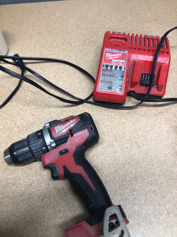 Photo 2 of (DOES NOT INCLUDE BATTERY)
Milwaukee M18 18-Volt Lithium-Ion Brushless Cordless 1/2 in. Compact Drill/Driver and charger