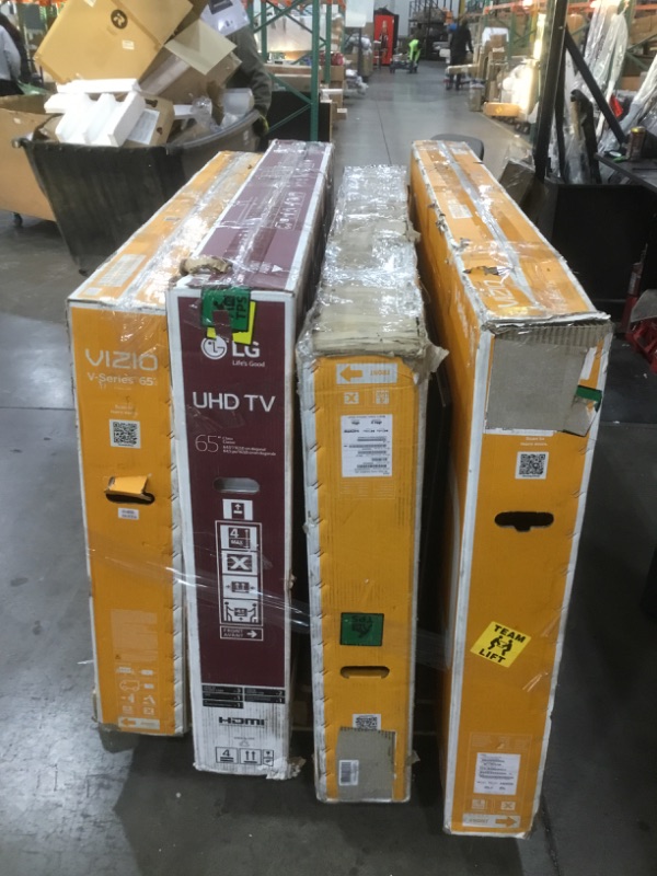 Photo 1 of Pallet of assorted broken and damaged TVs sold as is, no returns or refunds