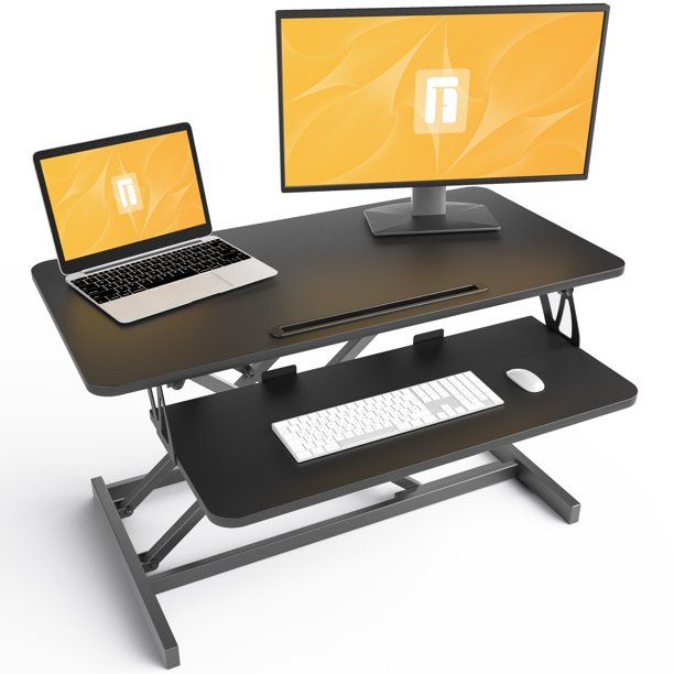 Photo 1 of FEZIBO Adjustable Height Standing Desk Converter for Dual Monitor, Black Finish, 32"
